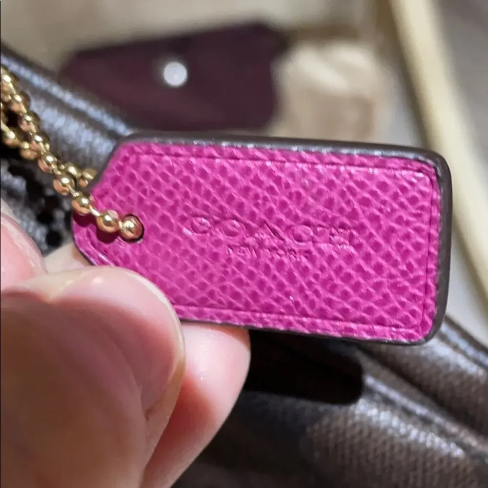 Coach wristlet brown print raspberry accents nwot